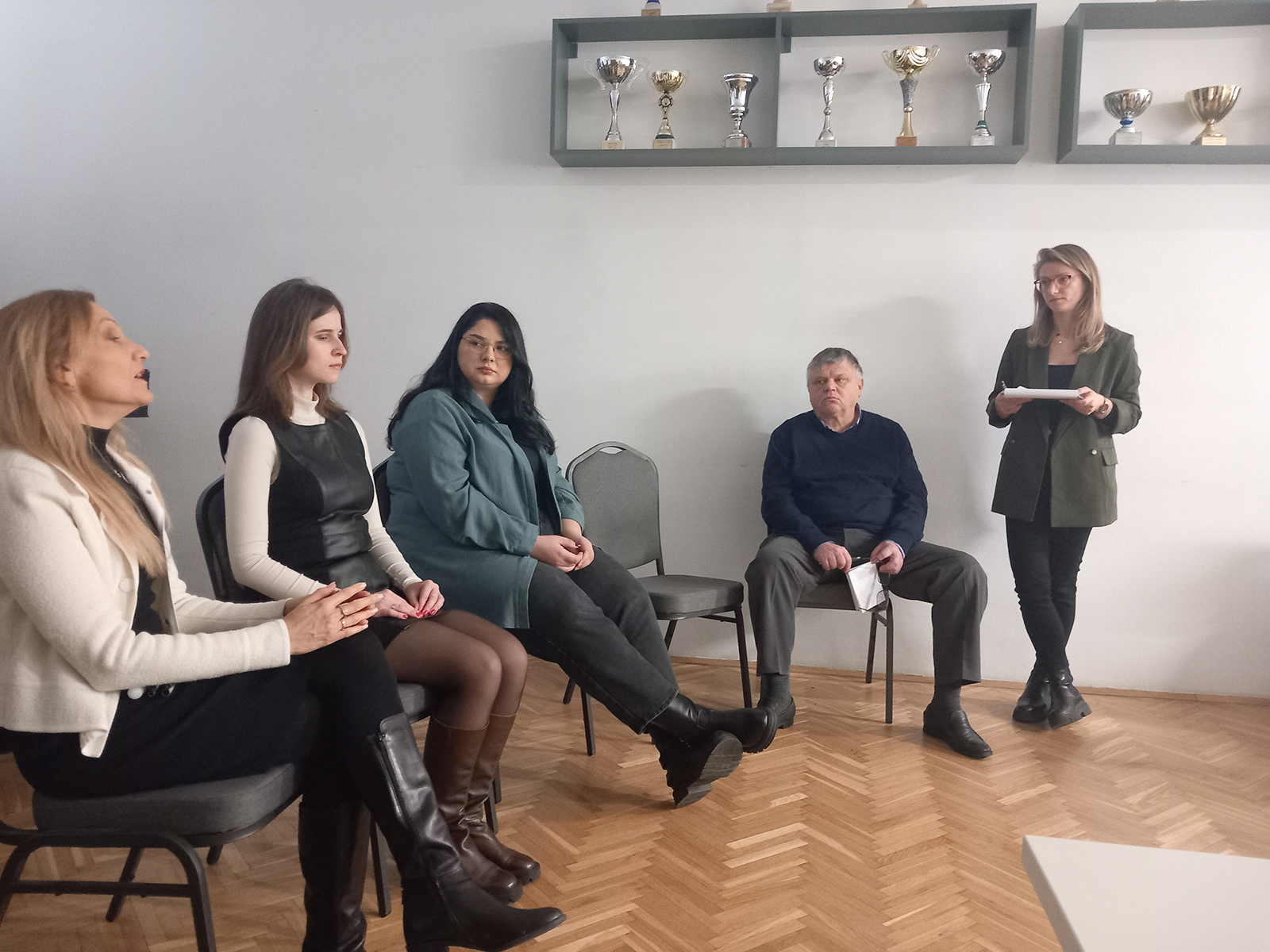 Panel discussion in front of a small audience.